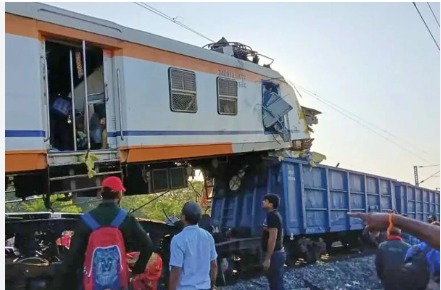 Rescue teams and locals working at night amid wreckage after the Chhattisgarh train collision.