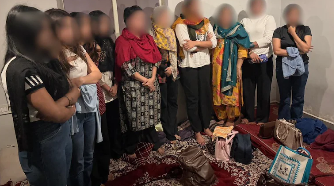 Police officers conducting a raid at a spa in Visakhapatnam suspected of operating a prostitution racket