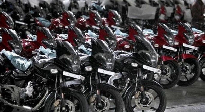 Showroom with multiple two-wheelers and cars sold during festive season in India