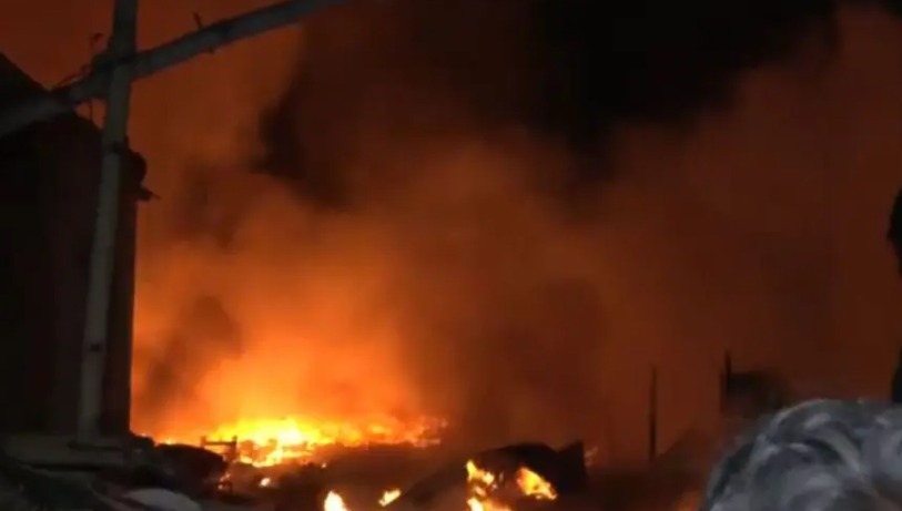 Firefighters battling a massive blaze in Bengali Basti near Rithala Metro Station, Delh