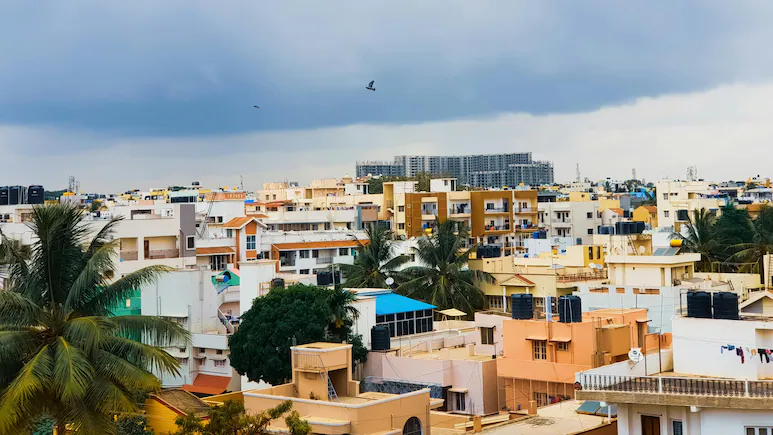 A Kannadiga walking through MG Road, Bengaluru, feeling nostalgic about the city’s cultural transformation.
