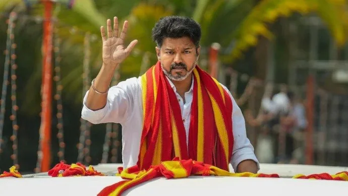 Vijay addressing public meeting after accusing DMK of slander politics