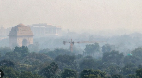 A smog-filled skyline with heat haze and flooded streets representing India’s rising climate vulnerabilities.