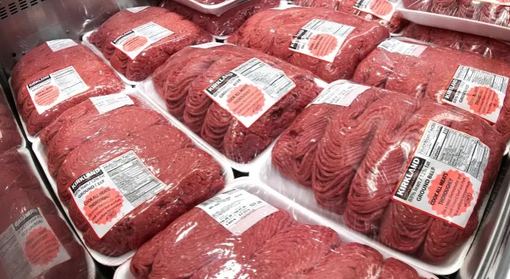 Beef and coffee products displayed in a US supermarket as tariff cuts are announced to reduce food prices.