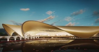 Exterior view of Navi Mumbai International Airport terminal and runway during final preparations.