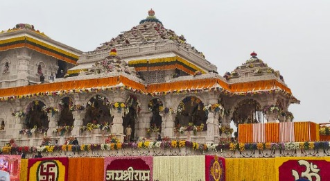 Ayodhya Ram Temple main spire with saffron flag hoisting preparations in progress.