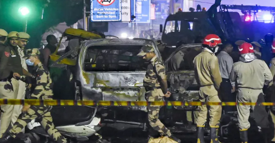 Investigating officers analyzing documents and evidence related to Delhi blast probe