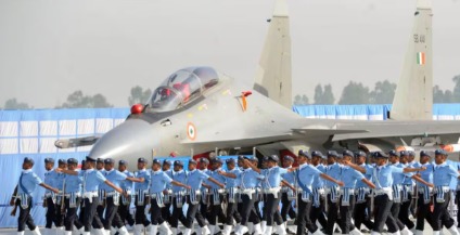 Indian Air Force aspirants viewing AFCAT 1 Exam 2026 notification details with IAF aircraft and officers in the background