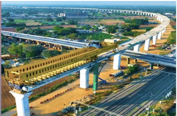 Construction of Mumbai–Ahmedabad bullet train corridor with elevated viaduct segments near Surat–Bilimora section.