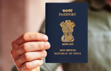 Indian passports with airport departure signage reflecting travel protocol changes due to Iranian visa suspension.