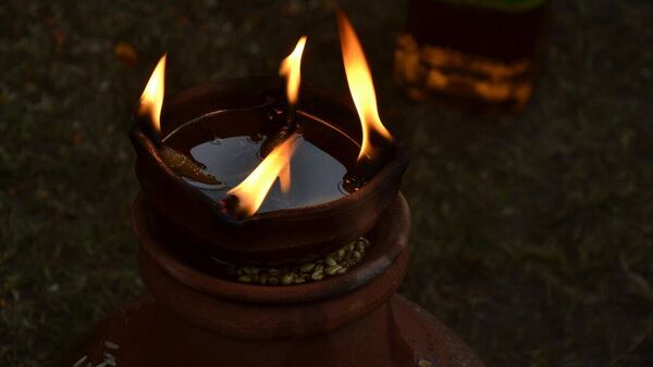 Devotees performing rituals on Margashirsha Amavasya 2025