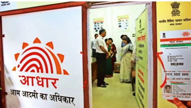 “Child updating biometrics for Blue Baal Aadhaar at Aadhaar enrollment center”