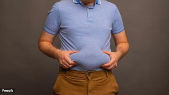 An Indian teenager surrounded by packaged ultra-processed food items symbolizing rising obesity and diabetes risk.