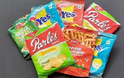 Chips packet with small toy inside symbolising choking hazard for children