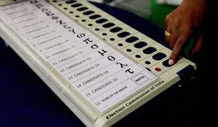 Bihar voter pressing NOTA button on EVM during assembly elections