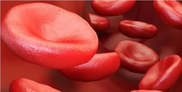 “Laboratory researcher pipetting DNA sample in a genomics lab, representing gene editing therapy for sickle cell disease”