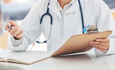 Doctor and patient discussing insurance documentation requirements