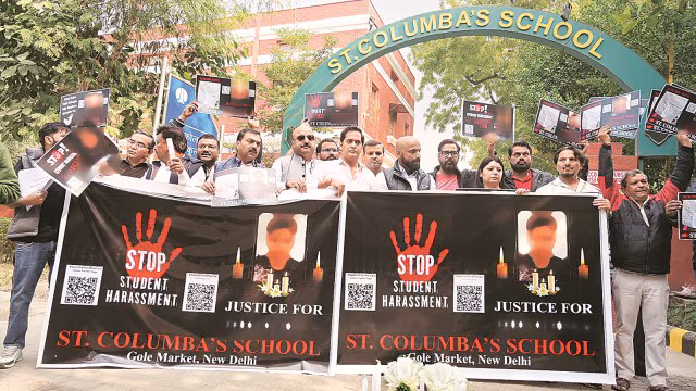 Image showing a Delhi school building with police presence during student suicide investigation.