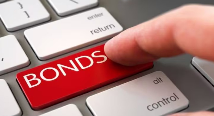 Investor buying bonds through online bond platform on laptop