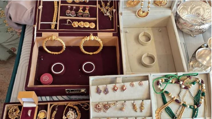 Karnataka Lokayukta officers conducting coordinated raids across eight districts in a disproportionate assets case