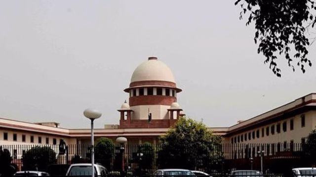 Supreme Court building representing judgment on dismissed Army officer refusing Sarva Dharma Sthal entry