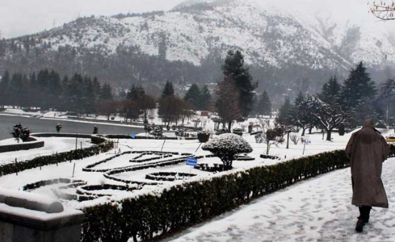 Snow-covered road outside a school in Jammu and Kashmir during winter vacations 2025