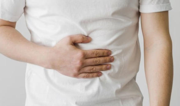 A gastroenterologist explaining how chronic heartburn and difficulty swallowing can increase the risk of oesophageal cancer.