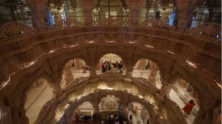 Ram Mandir Ayodhya construction site with artisans and workers