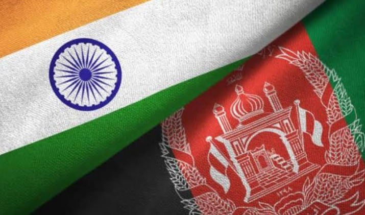 India and Afghanistan flags with trade containers representing regional trade partnership