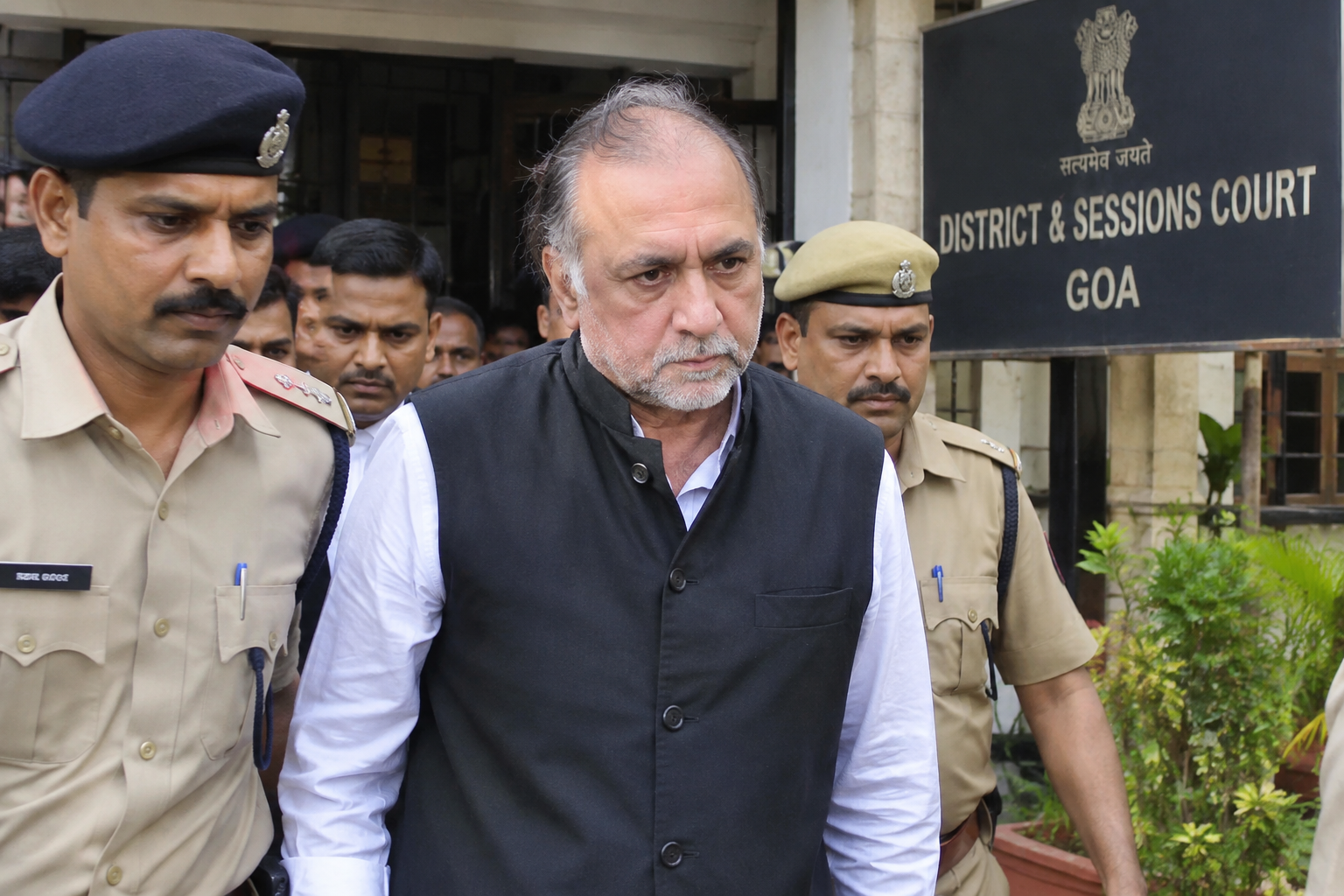 Tarun Tejpal surrendering before a Goa court to begin his 10-year prison sentence in the 2013 sexual assault case.